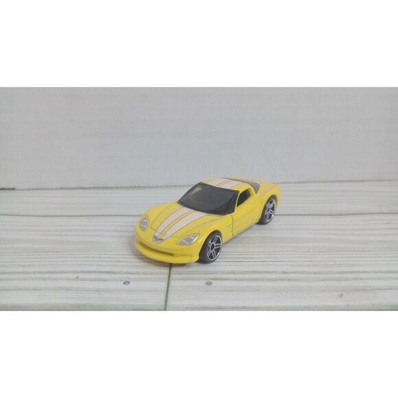 Hot Wheels Chevrolet Corvette C6, Yellow with White Stripes, 1:64; Loose - Picture 1 of 7